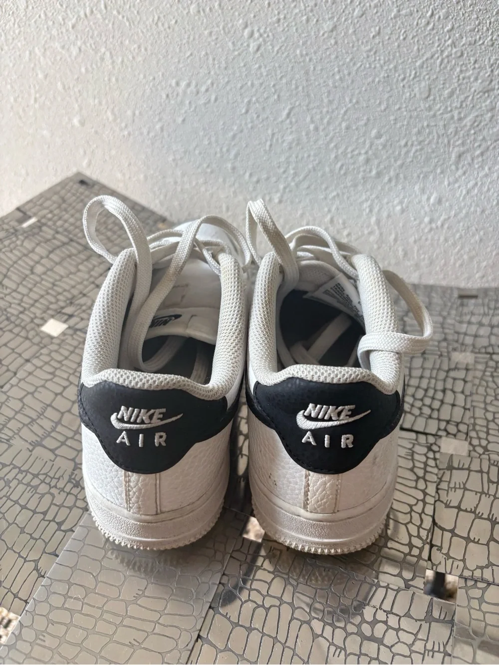 Nike Kids White Lace-Up Sneakers with Subtle Gray Accents